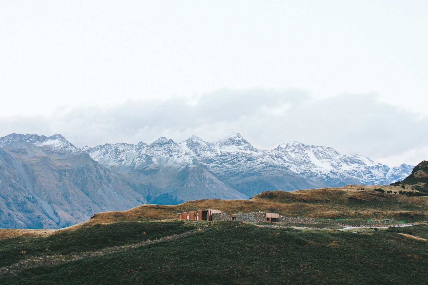 Snowy mountains overlooking a lake